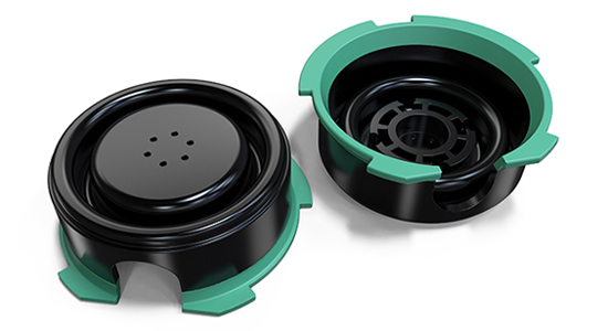 Black and green injection moulded parts