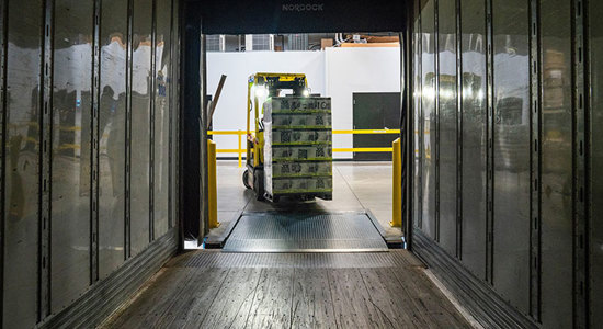 Loading containers onto a truck