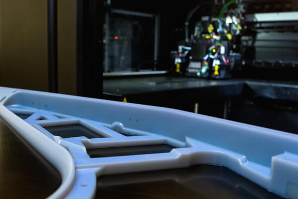 Mutli jet fusion part being printed